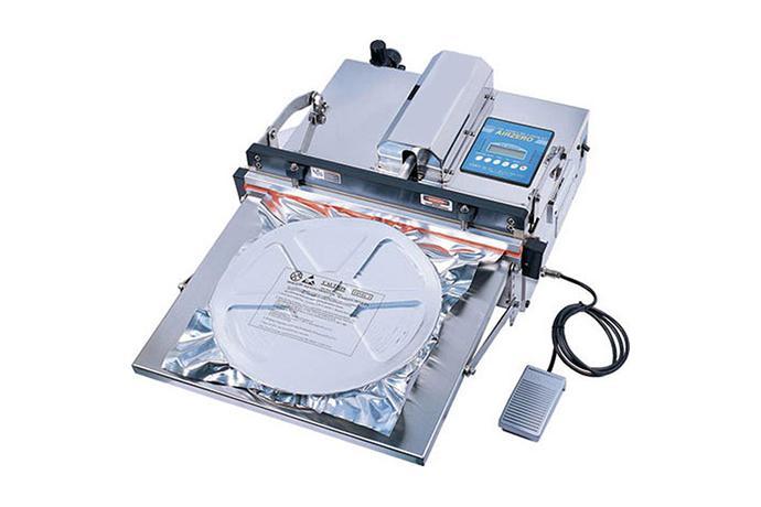 Table Type Nozzle & Gas Filling Packaging Machine