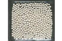 Zircon glass bead